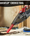 Scorpion Plus Handheld Vacuum Cleaner With Powerful Suction Lightweight Corded Design Includes Pivoting Stair And Upholstery Tool Crevice Tool in use on dirt