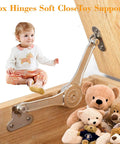Heavy Duty Crate Soft Close Hinges 2 Pack Lid Support for Toy Boxes Wooden Crates, shown installed holding open a wooden toy box lid.