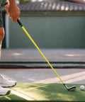 Golfer using ButterBlade Training Club For Golfers, Real Time Feedback To Improve Swing Mechanics And Accuracy