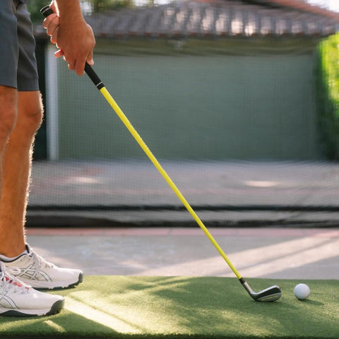 Golfer using ButterBlade Training Club For Golfers, Real Time Feedback To Improve Swing Mechanics And Accuracy