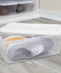 Clear Plastic Storage Bins With Lids 6 Quart Stackable Organizer Boxes showing shoes inside for easy closet organization.