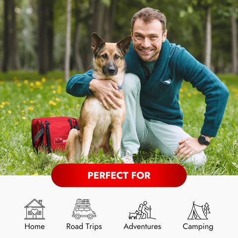 Man with dog next to red Cat And Dog First Aid Kit For Home And Travel With Thermometer Wound Care Supplies Bandages Antiseptic in park.