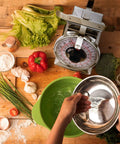 2 Pound Analog Food Scale With 32 Ounces Capacity Stainless Steel Mechanical Kitchen Scale Removable Bowl Tare Function in use
