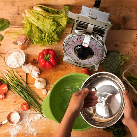 2 Pound Analog Food Scale With 32 Ounces Capacity Stainless Steel Mechanical Kitchen Scale Removable Bowl Tare Function in use