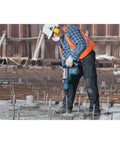 Worker using 1-1/4 Inch By 21 Inch SDS-Max Speed-X Rotary Hammer Bit For Concrete Drilling With Inclined Side Cutters on site