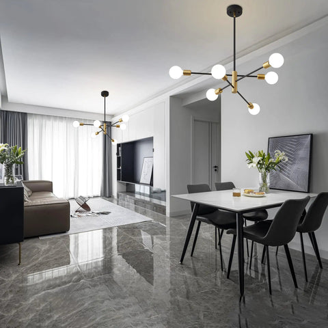 Sputnik Chandelier Pendant Light Black And Gold, Mid Century Modern E26 Ceiling Fixture in a modern living and dining area.