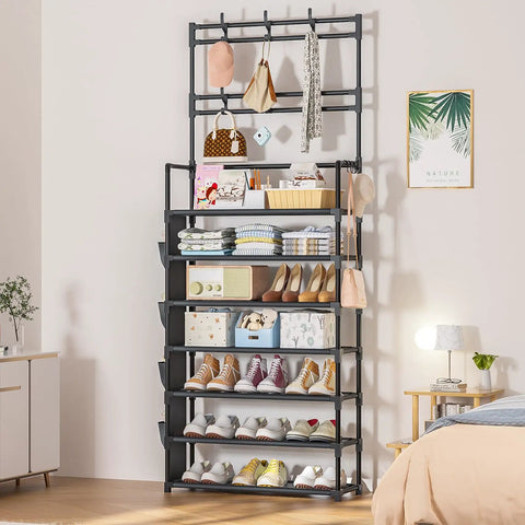 7 Tier Shoe Organizer With Hooks And Side Pocket Freestanding Shoe Rack For Front Door Entryway Holds 21 To 28 Pairs Big Capacity Shoe Shelf Tower For Garage Closet Or Hallway with shoes and accessories displayed.
