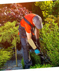 Person wearing Heavy Duty Aramid Arm Guards For Women, Badass Forearm Shields For Gardening And Yard Work, Cut Resistant Sleeves while gardening.