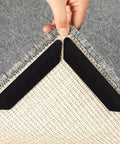 Applying 12 Pack Double Sided Rug Tape For Hardwood Floors And Tiles to rug corner, visible tape edges preventing curling and bunching.