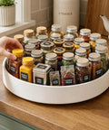 11.8 Inch Lazy Susan For Refrigerator And Pantry, Round Kitchen Turntable Spice Rack Organizer displaying spices in a white tray.
