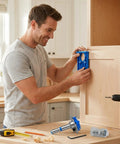 Man using This Heavy Handed 35mm Concealed Door Hinge Drilling Jig Kit to install hinges on a cabinet.