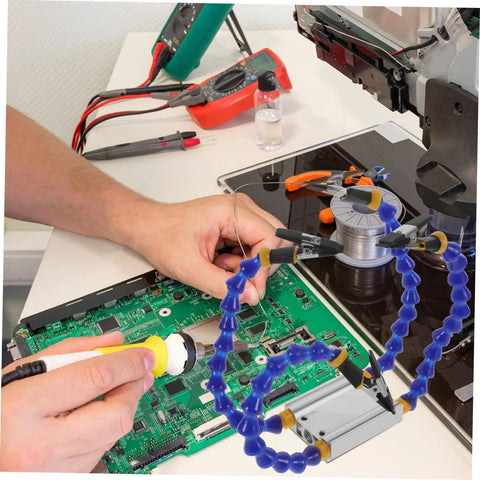 Multifunction Soldering Station And Welding Table Stand With Arms And Base Portable Helping Hands Tool in use on PCB