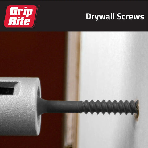 Close-up of Heavy Duty Six By Two Inch Phillips Bugle Head Drywall Screws featuring fine threads being installed in drywall