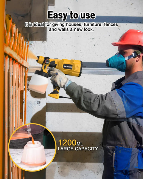 ProGrade 700W Airless Paint Sprayer And Hvlp Spray Gun With Four Swappable Tips And Three Pattern Options Including Integrated Blower And 1200Ml Cup in use, painting a fence.