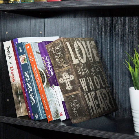 Hidden Book Safe Storage Box With Key Lock Disguised Dictionary Safe Butterfly Design on shelf with books and plant