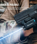Person holding Baldr S Blue Beam Tactical Flashlight With 800 Lumens White LED on camo gear rail, blue beam active