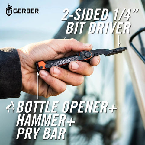 Hand holding 8 In 1 EDC Multitool Pocket Knife With Blade Pry Bar Hammer Saw Bottle Opener And Two Sided Quarter Inch Bit Driver.