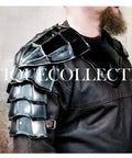 Close-up of Medieval Blackened Pauldrons And Gorget Set For Berserk Guts Style Armor with leather straps
