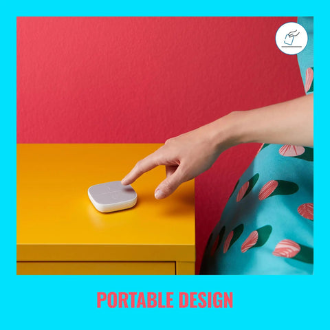 Person using Portable Smart Button Wireless Light Switch With App Control Battery Powered 50 Foot Range One Tap To Turn Lights On, Off, And Dim Includes 2 AAA Batteries Perfect For Home Automation on yellow table