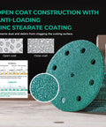 Close-up of 5 Inch 9 Hole 80 Grit Hook And Loop Sanding Discs For 125 Series Orbital Sanders with open coat construction details