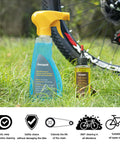Bike Chain Cleaner Kit With Chain Lubricant And Biodegradable Degreaser bottles on grass near bike wheel