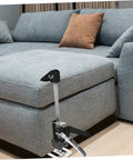 No Fuss Heavy Duty Manual Furniture Lifter 2 Pack Appliance Jack propping up a sectional sofa in a modern living room.