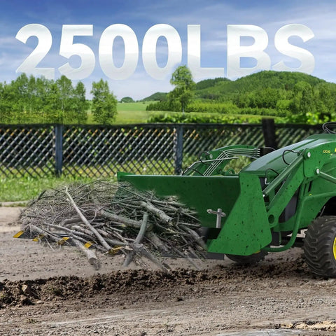 Heavy Duty 42 Inch Clamp On Debris Forks For Skid Steer And Tractor Loaders With 2500 Lbs Capacity in use on green tractor.
