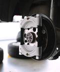 Bearing Puller Kit 14 Piece 5 Ton Automotive Bearing Separator with 2 and 3 Inch Jaws installed on wheel hub
