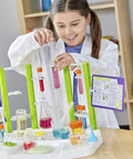 Child using Ooze Labs Chemistry Station Science Kit For Kids With 57 Pieces And 20 Safe Experiments Including Slime Making