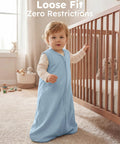 Baby in crib wearing 2 Pack Baby Sleep Sack 0-6 Months 0.5 Tog 100 Percent Cotton Wearable Blanket With 2-Way Zipper, Blue Rockets Design