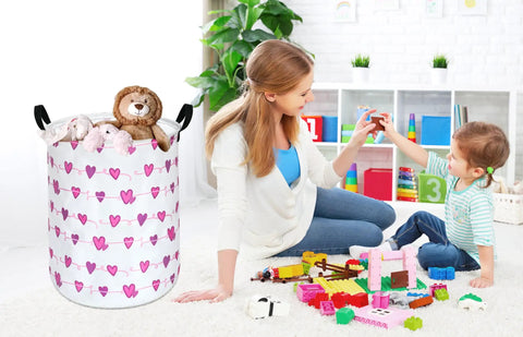 Round Laundry Basket Storage Bin For Home And Nursery beside mother and child playing with toy blocks in playroom