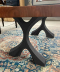Industrial Coffee Table Legs Set Of 2, 16.1 Inches High, Heavy Duty Support For Sofa Tables, Minimalist Rustic Farmhouse Vibe With Natural Curves, Built To Last under a wooden table, on a decorative rug.