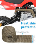 Dirt bike with heat shield protection and exhaust wrap, showcasing One Point One Inch Motorcycle Slip On Muffler Universal 28mm Exhaust Silencer.