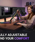 Woman using RGB Microphone Boom Arm With Controllable Lighting, Adjustable Low Profile Desk Clamp Mic Stand, BM88Pro in studio setup