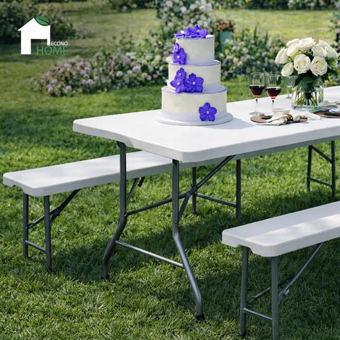 6 Foot Folding Table And Two Benches Outdoor Indoor Picnic Set Built Tough Durable Plastic With Space Saving Design For Quick Party Ready Storage And Transport Seats 6 To 8 People shown with cake and flowers