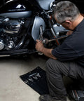 Mechanic using tools from Heavy Duty 24 oz Canvas Large Wrench Roll Tool Bag For Large Wrenches With 3 Grommets For Hanging Storage