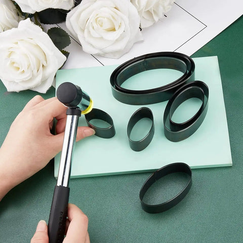 Elliptical Leather Punch Tool Set With Cutting Dies For Hole Punching High Carbon Steel DIY Leather Craft Kit displayed with flowers