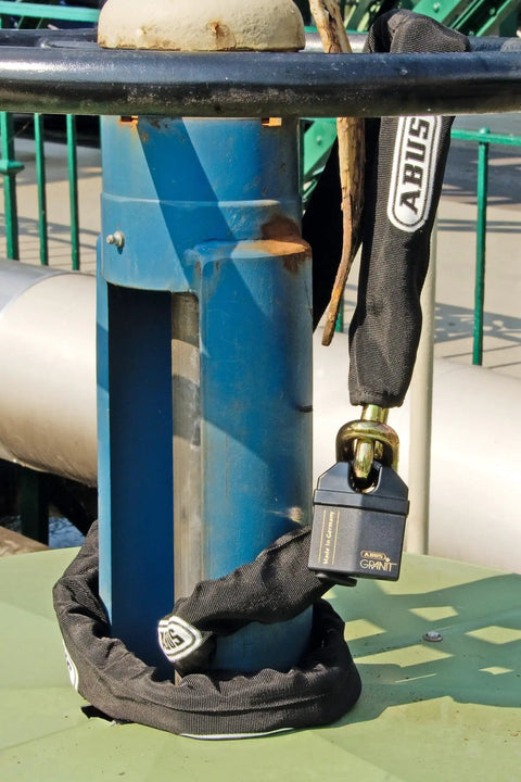 Granit Padlock For Outdoor Use Hardened Special Steel With Plus Disc Cylinder Rekeyable Mechanism on blue gate.