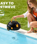 Person retrieving Cordless Robotic Pool Cleaner With Dual Motors And Beastly Suction For Above Ground And Inground Flat Pools 120 Minute Runtime Auto Parking Powerful Debris Pickup For Up To 1100 Sq Ft from pool