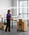 Person using Remin Kart A Bag Tri Kart Heavy Duty Utility Cart with telescopic handle in office setting.