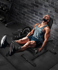 Man using 2 In 1 Leg Extension And Curl Machine For Home Gym Full Leg Day Trainer That Targets Quads And Hamstrings with black finish.