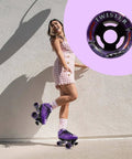 Person skating with purple roller skates, featuring a Twister Roller Skates Wheels Pack Of 8 In 95A Urethane 62mm By 42mm Size inset