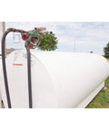 Fuel tank outdoors with Goldenrod Water Absorbing Fuel Filter Replacement Canister With 10 Micron Filtration For Gasoline Diesel Ethanol And Biodiesel attached