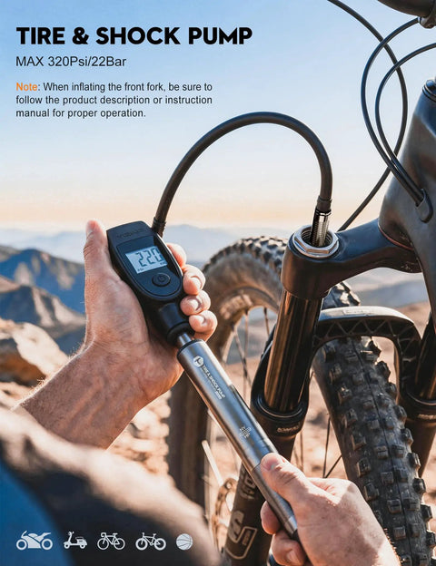 Using the 320 PSI High Pressure Bike Shock Pump With Gauge For Front Fork And Rear Suspension Aluminum Portable Frame Pump outdoors