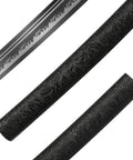 Hand Forged Steel Samurai Sword With Clay Tempered Blade Unsharpened Practice Katana close-up of blade and ornate black scabbard