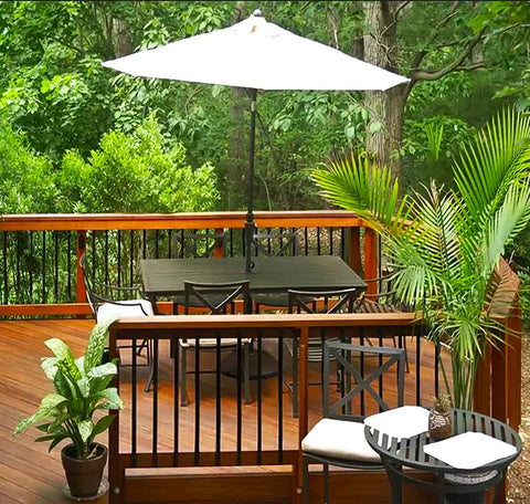 Outdoor deck with Aluminum Grooved Porch Railing Balusters For Deck And Staircase Nearly 30 Inch Long Matte Black 48 Pack.