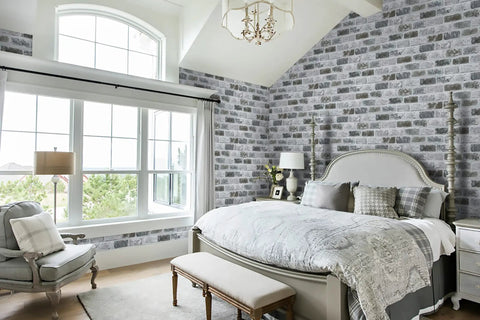 Bedroom with Gray Brick Peel And Stick Wallpaper With Realistic 3D Texture Self Adhesive Removable Contact Paper For Kitchen Accent Wall Decor Vintage Brick Look Easy Install Durable Faux Wall Covering For Any Room, large windows, bed, and chandelier.