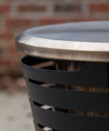 Closeup of gold 25.6 inch Tabletop Fire Pit Cover For Patio Pits 25.6 Inch Durable Stainless Steel Lid Weather Resistant Outdoor Fire Pit Protector Converts Fire Pit Into A Table For Chill Entertaining Gold on fire pit.