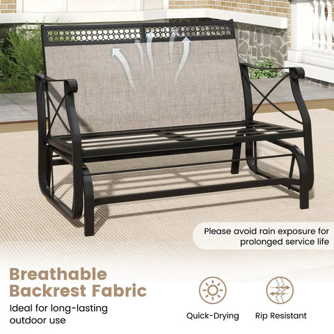 Two Person Patio Glider Bench With Comfy Cushions And Breathable Fabric displayed outside on a patio with durable metal frame.