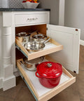 Heavy Duty Custom Fit Slide Out Shelf With Full Extension Glide Rails For Kitchen Cabinets holds pots in a white cabinet.